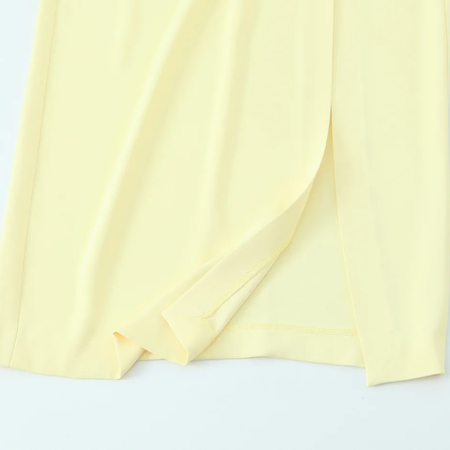 Ava | Elegant Sleeveless Long Dress with Split Hem and Fold Detail